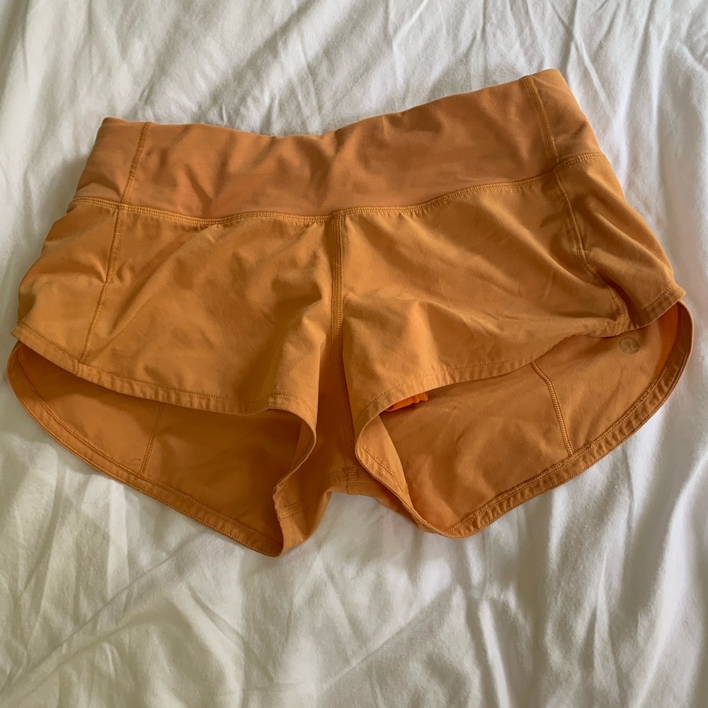 size 2 light orange speed up shorts